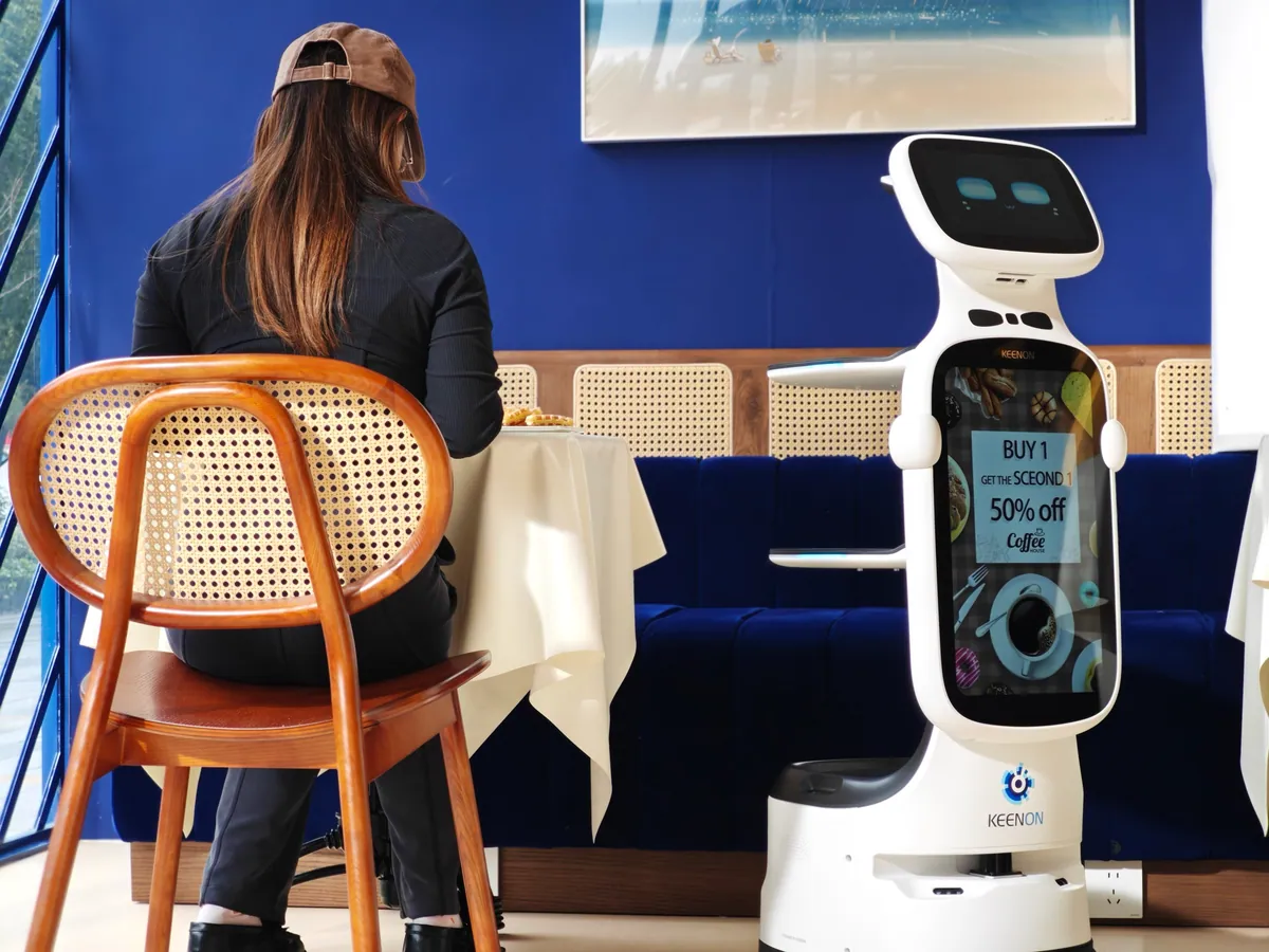 KEENON DINERBOT T11 — photo 3